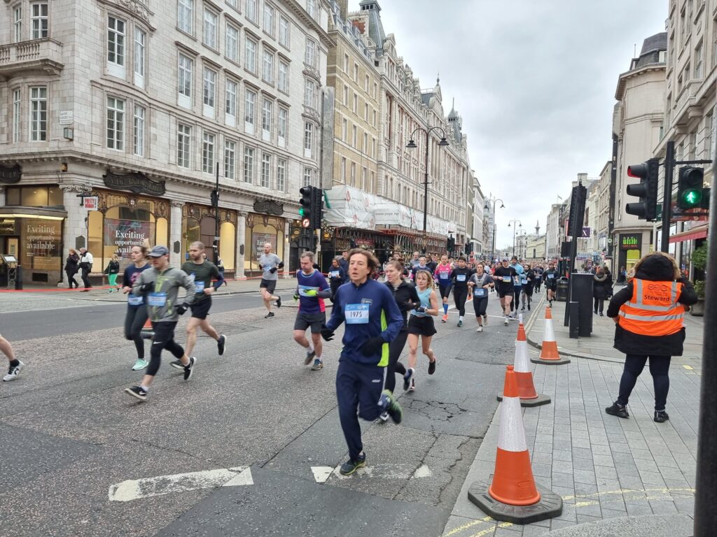 people in running gear on the closed roads of London