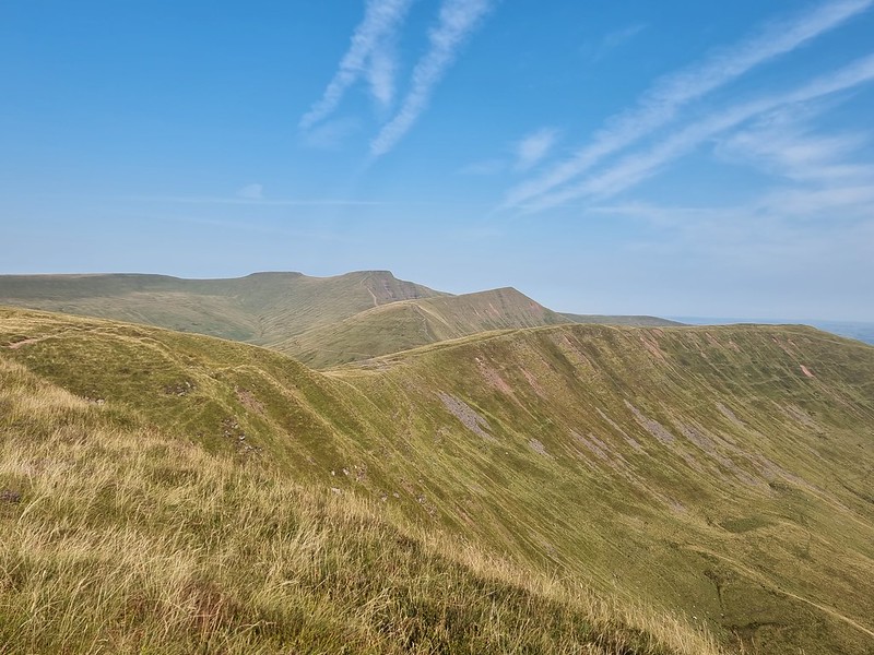 A view of Fan Y Big, Cribyn, Pen Y Fan and Corn Du. Green hills and blue sky