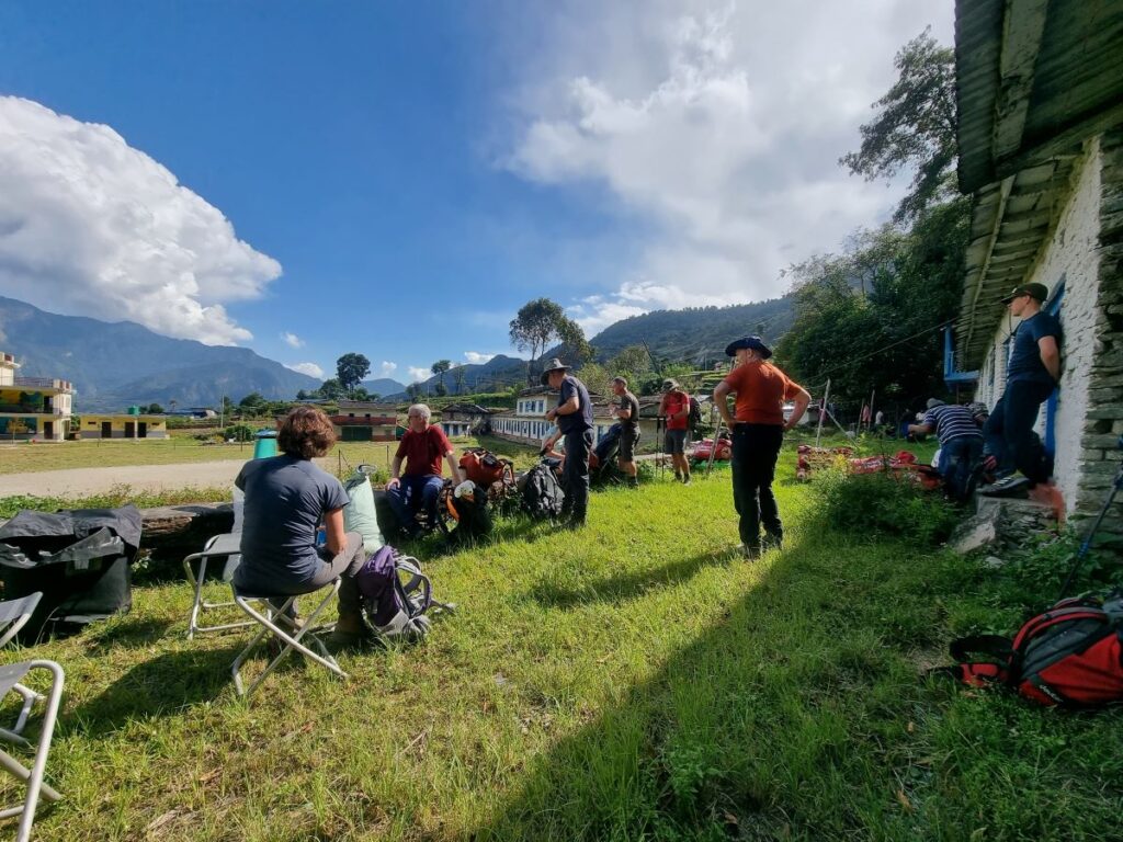 The team sitting around at the end of day 1 trek. No tents yet